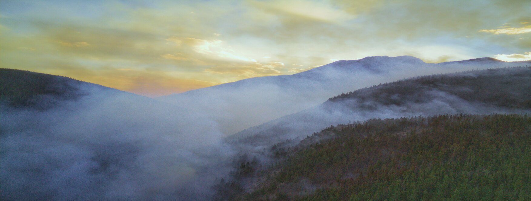 Misty mountains at sunrise
